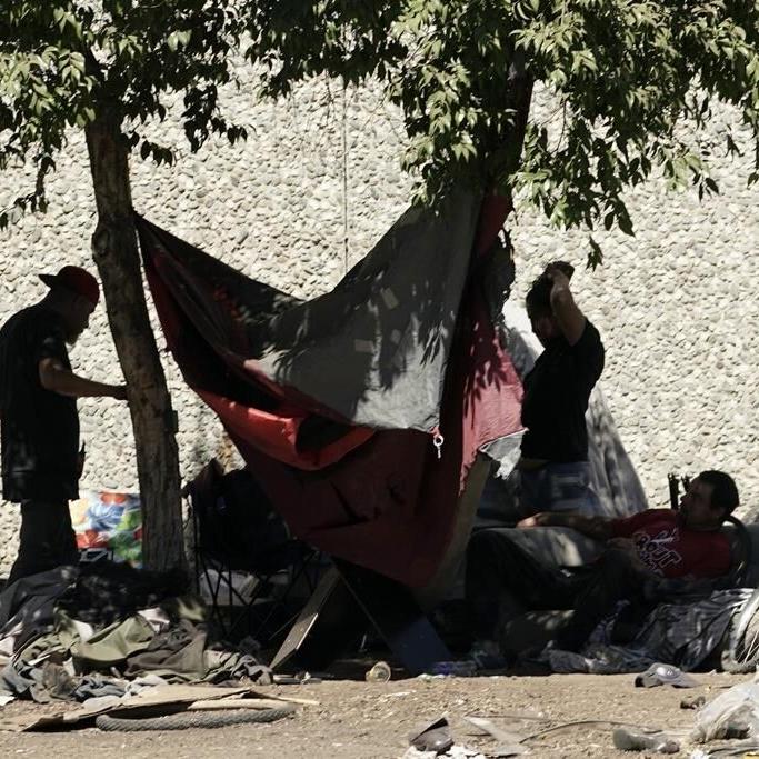 Federal judge says California's capital city can't clear homeless camps during extreme heat